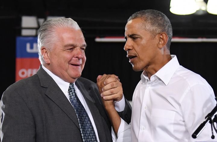 Nevada Democratic gubernatorial nominee Steve Sisolak, seen here at a recent rally with former President Barack Obama, is among the party's candidates offering a full embrace of legalized marijuana use.