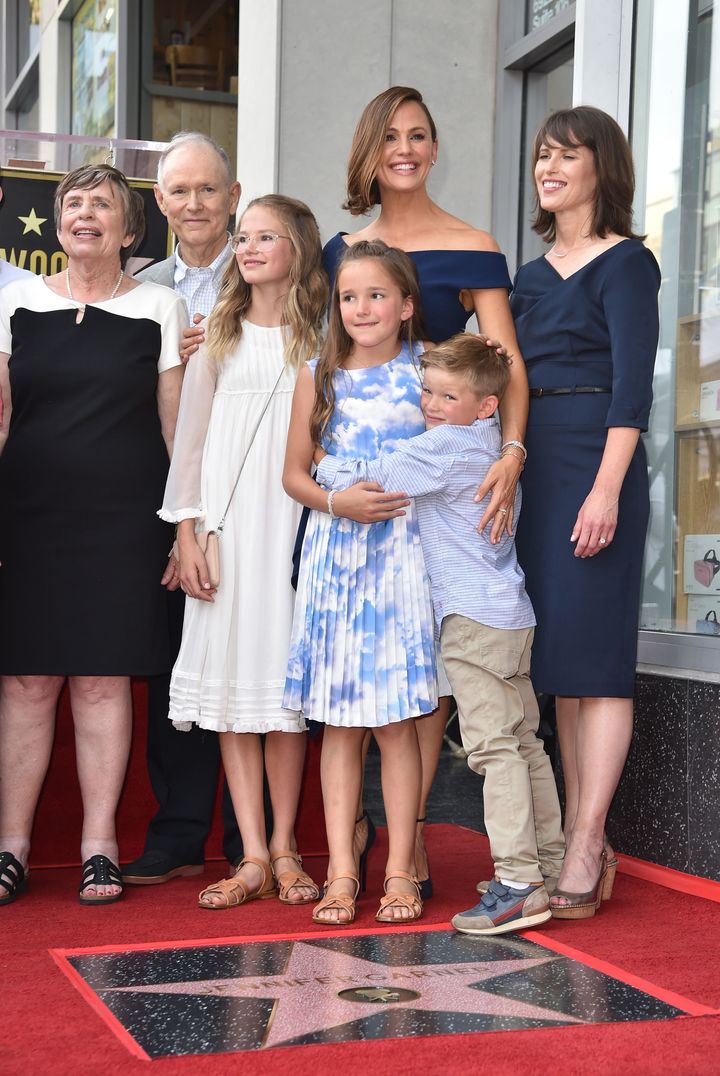 Jennifer Garner poses with her family at her Hollywood Walk of Fame ceremony in August.