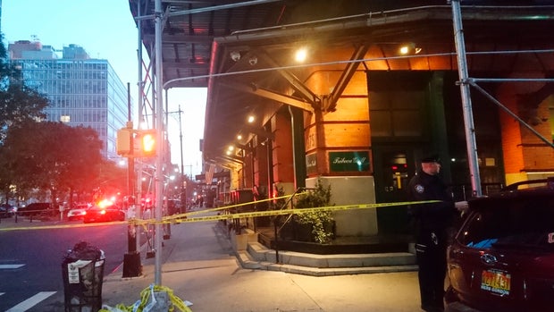 A police officer blocks off an area responding to reports of a suspicious package in the Tribeca neighborhood in New York on Thursday, Oct. 25, 2018. (AP Photo/Ron DePasquale)