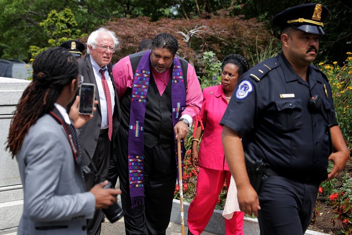 Sanders and Representative Sheila Jackson Lee (Texas) walked with Reverend William Barber of North Carolina, a civil rights leader