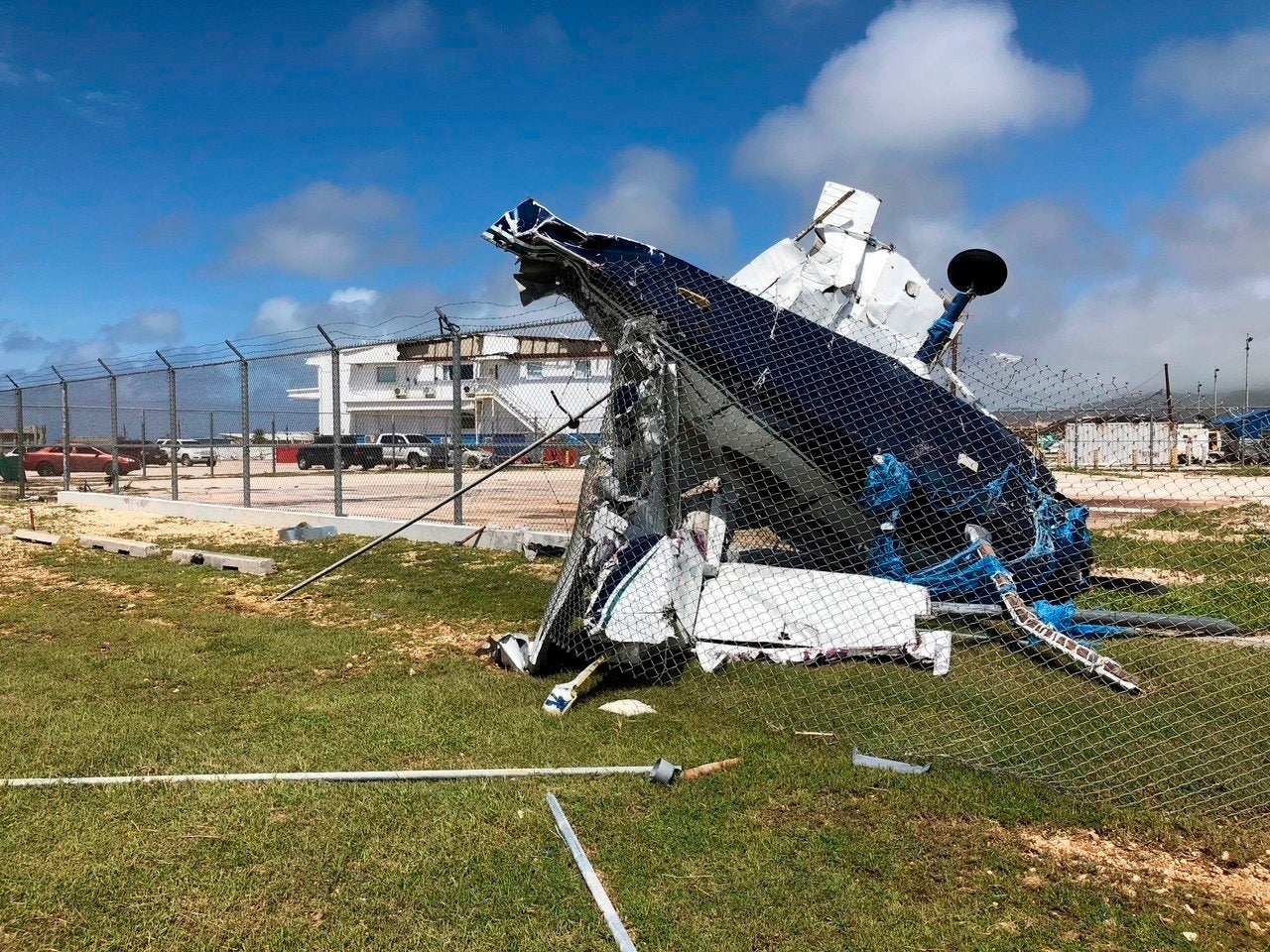 A damaged plane sits at the airport after Super Typhoon Yutu hit the U.S. Commonwealth of the Northern Mariana Islands on Friday.