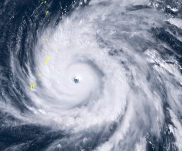 This satellite image provided by the National Oceanic and Atmospheric Administration (NOAA) shows Typhoon Yutu east of Guam Wednesday afternoon, Oct. 24, 2018 local time.