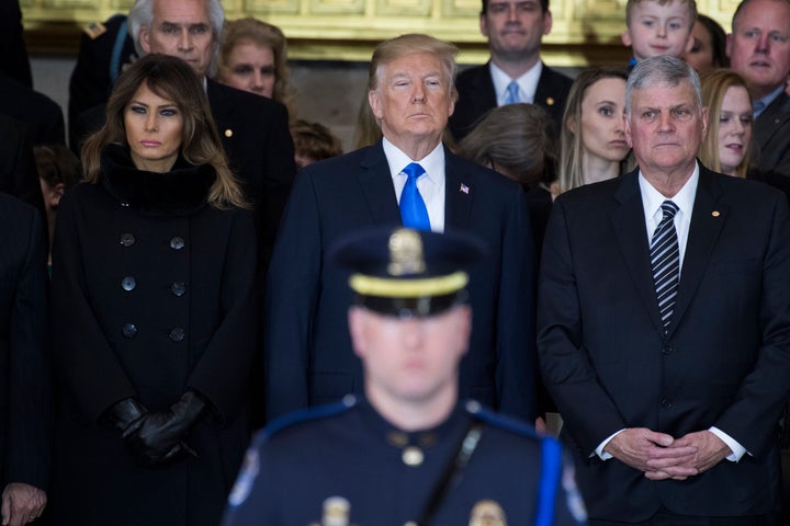 President Donald Trump, first lady Melania Trump and Franklin Graham attend a ceremony in the Capitol Rotunda as the late Rev