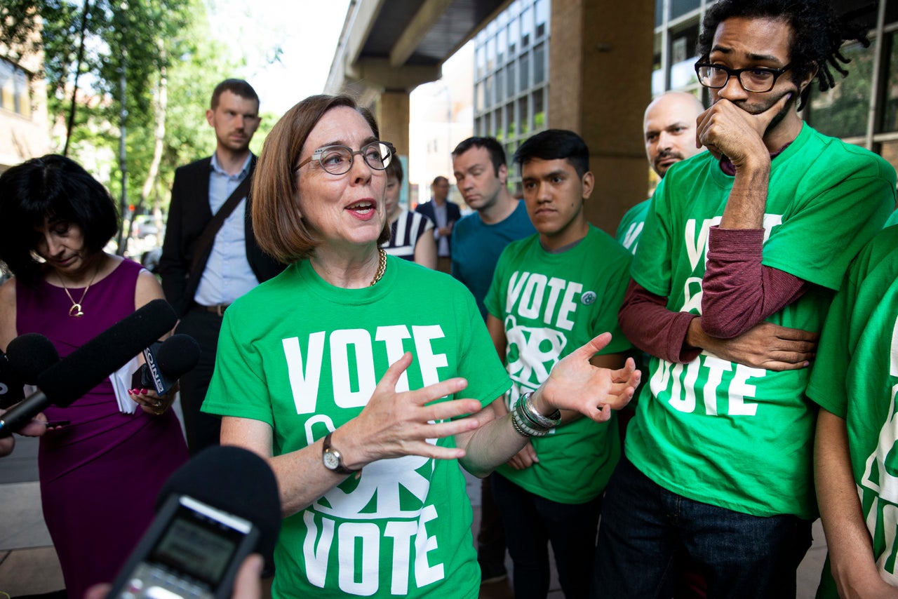 Gov. Kate Brown meets with supporters getting out the vote.