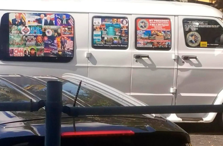 A photo taken by the husband of freelance journalist Lesley Abravanel, who spotted the van in November 2017 and took notice of it's particularly pro-Trump, anti-Democrat decoration.