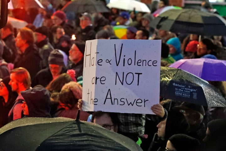 Thousands of people gathered in Squirrel Hill to pay tribute to the 11 people killed in Saturday's mass shooting.