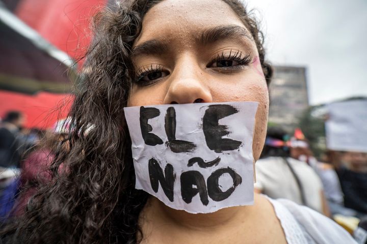 Weeks before the election, feminists, LGBTQ activists and other movements staged large anti-Bolsonaro protests under the slogan "Ele Não," or "Not Him."