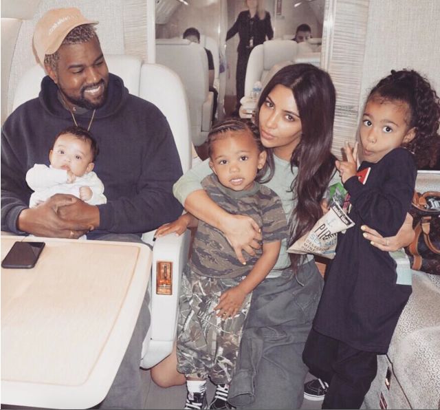 Kanye West and Kim Kardashian with their three children, Chicago, Saint and North. 