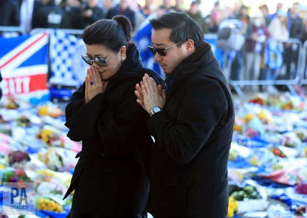 Aiyawatt Srivaddhanaprabha with his mother Aimon paying tribute to the billionaire