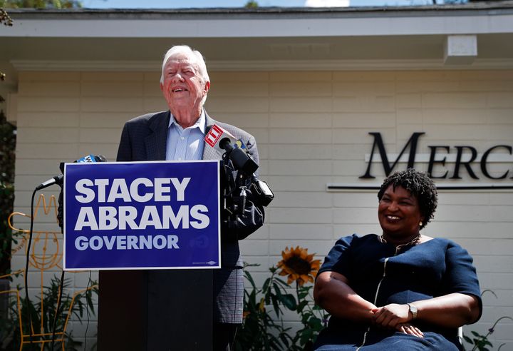Former President Jimmy Carter (left) campaigning with Georgia's Democratic gubernatorial nominee Stacey Abrams (right).