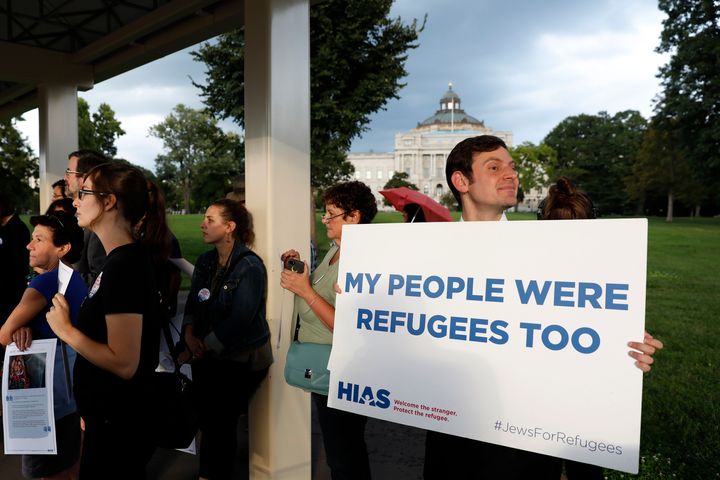 Demonstrators call on President Donald Trump to increase the number of refugees resettled in the United States in a protest organized by HIAS outside the U.S. Capitol on Sept. 14, 2017.