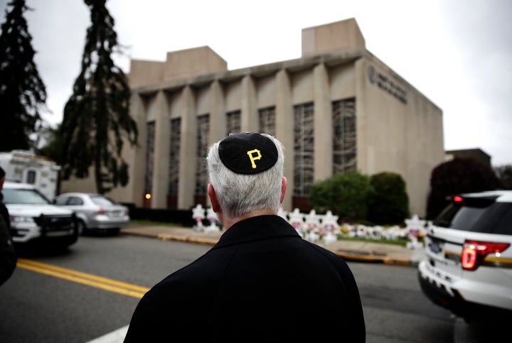 Rabbi Jeffrey Myers of the Tree of Life synagogue stands outside the house of worship on Oct. 29, 2018. He wears a yarmulke with a Pittsburgh Pirates logo.