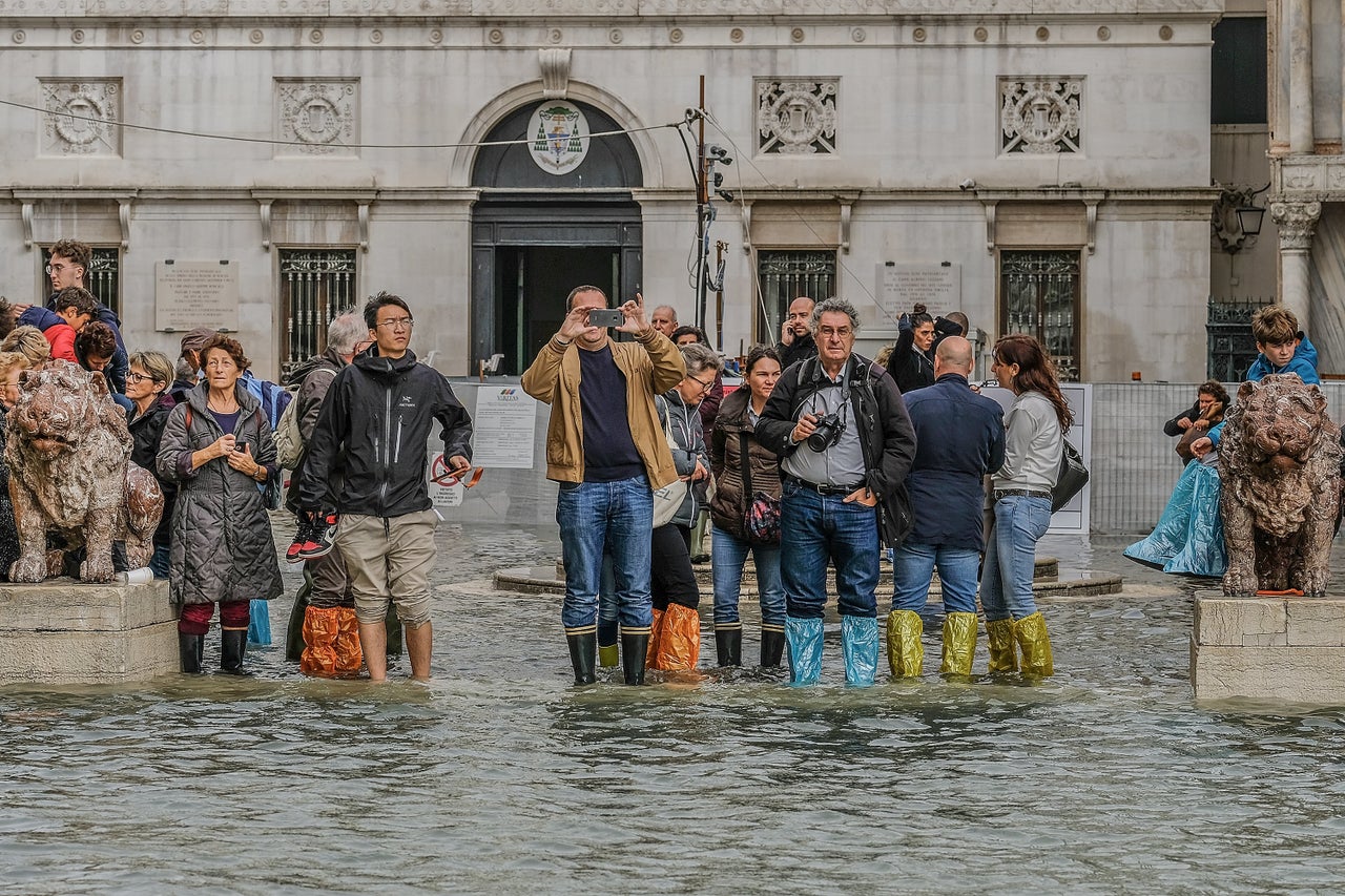 Schools and popular tourist sites were closed around Italy during a period of foul weather, including the Colosseum and the Roman Forum.