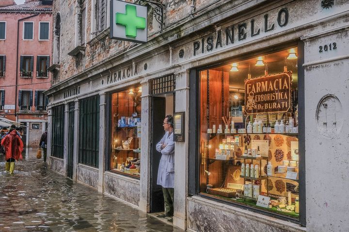 Shopkeepers and locals have become well-versed in dealing with Venice's regular flooding.