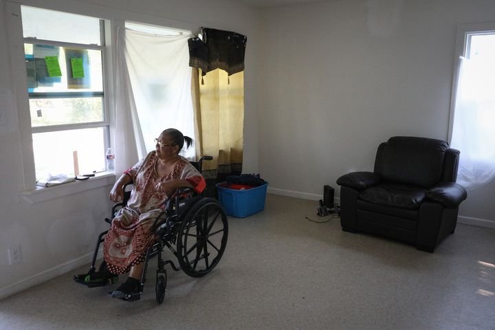 Dorothy Rainey is pictured in her home, which was badly damaged by Hurricane Harvey, in Houston's the Kashmere Gardens neighborhood.