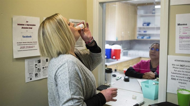 <p>A patient takes a dose of methadone at an opioid treatment clinic in Chatsworth, Georgia. The state is among a handful with a statutory limit on the number of clinics that can be licensed. </p>