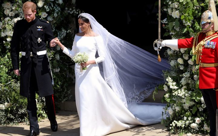 Prince Harry and Meghan Markle exit St. George's Chapel on May 19. 
