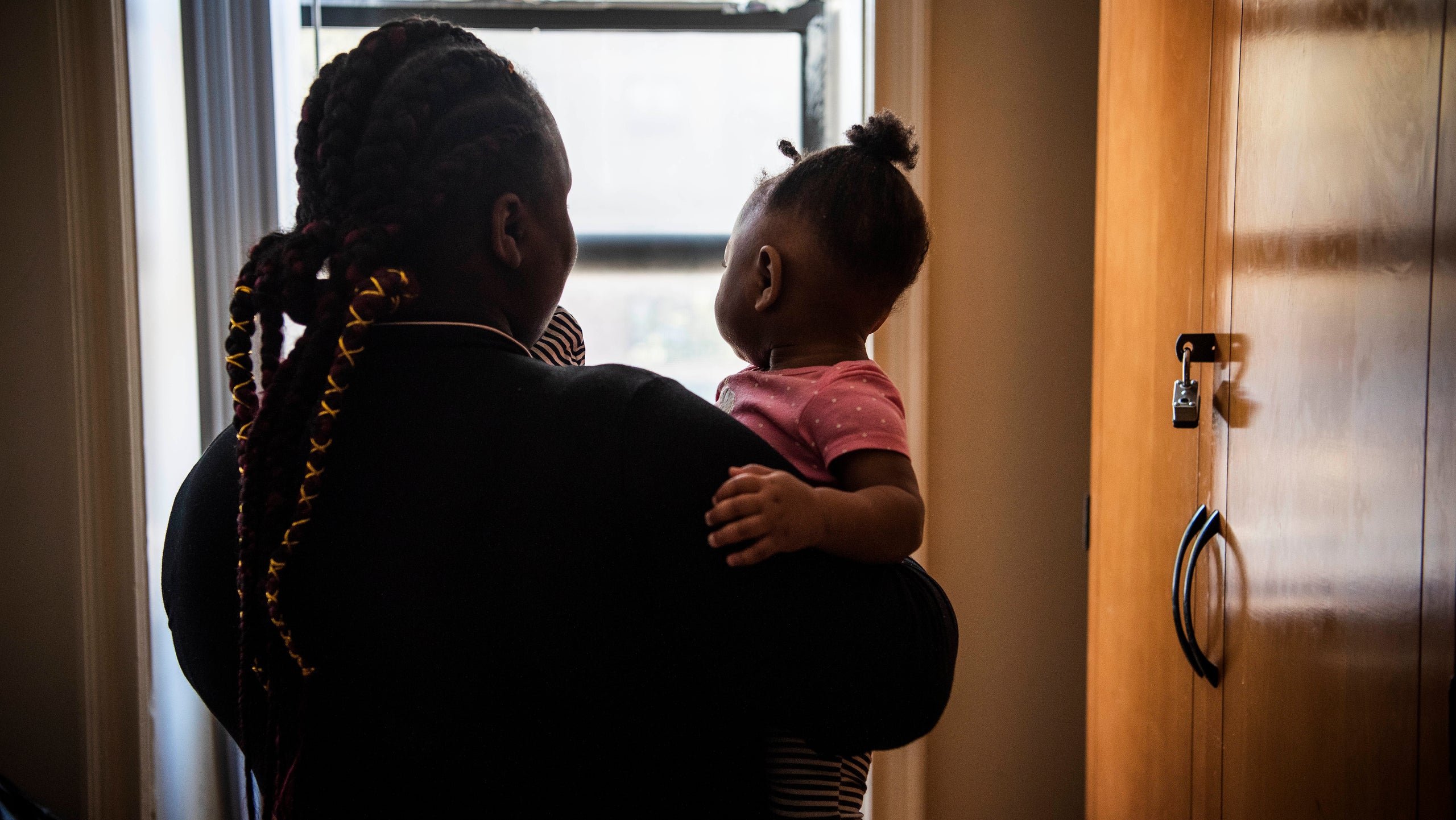 Amy poses for a portrait at an undisclosed domestic violence shelter in the New York City area on Oct. 25, 2018.