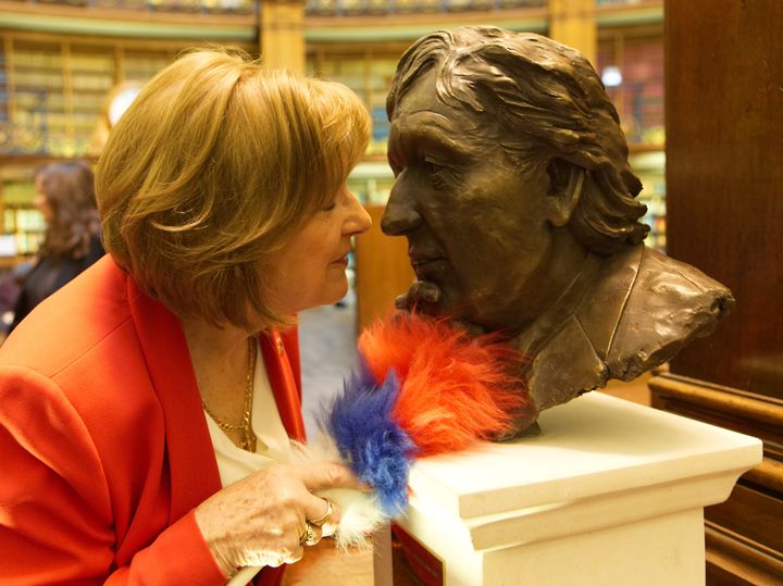 Lady Dodd with the sculpture of her late husband Sir Ken Dodd
