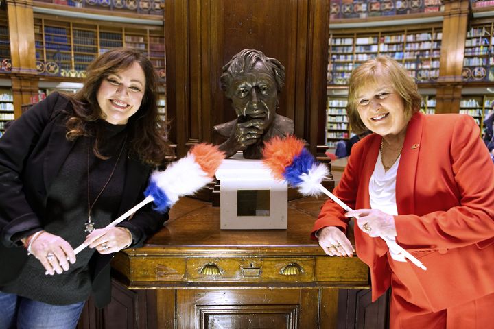 Sculptor Jane Robbins with Lady Dodd and her creation of Sir Ken Dodd