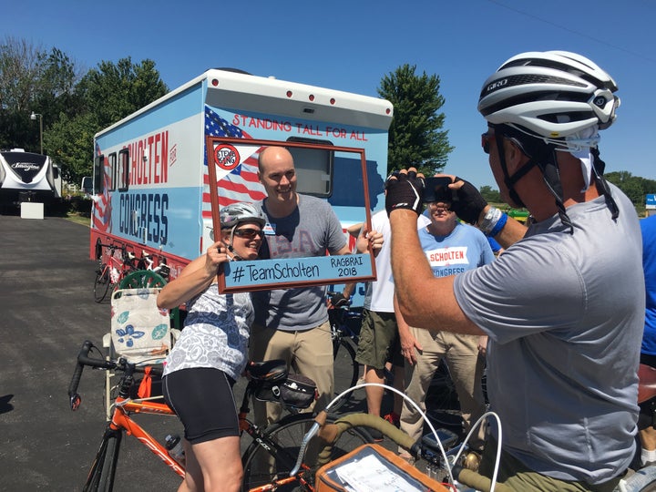 Democrat J.D. Scholten, seen in front of his campaign Winnebago, believes that populist economic policy can appeal to voters in Iowa’s 4th District.