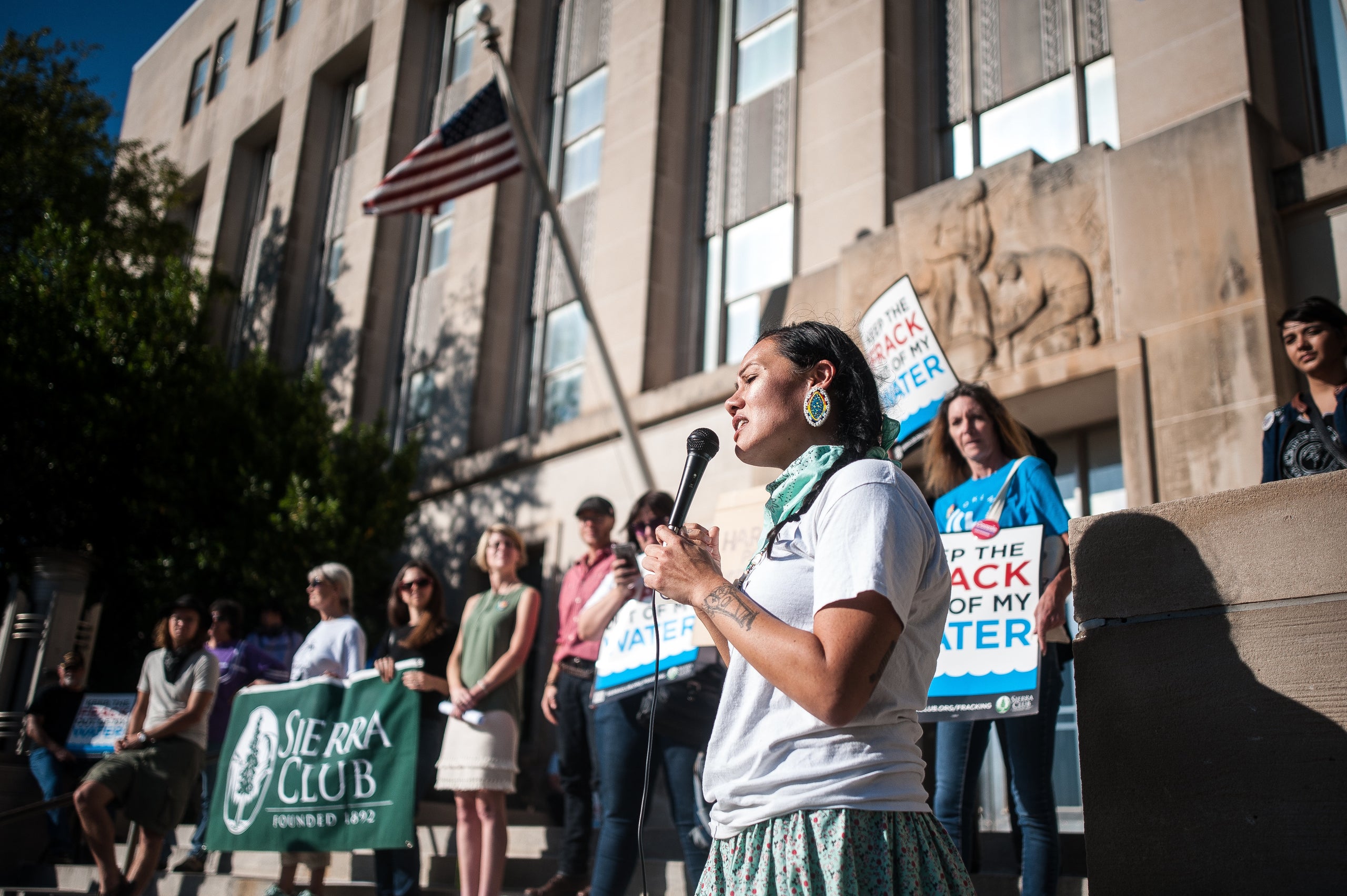 McCray, an enrolled member of the Absentee Shawnee Tribe of Oklahoma, speaks at the Oilfield Prayer Day protest in front of t