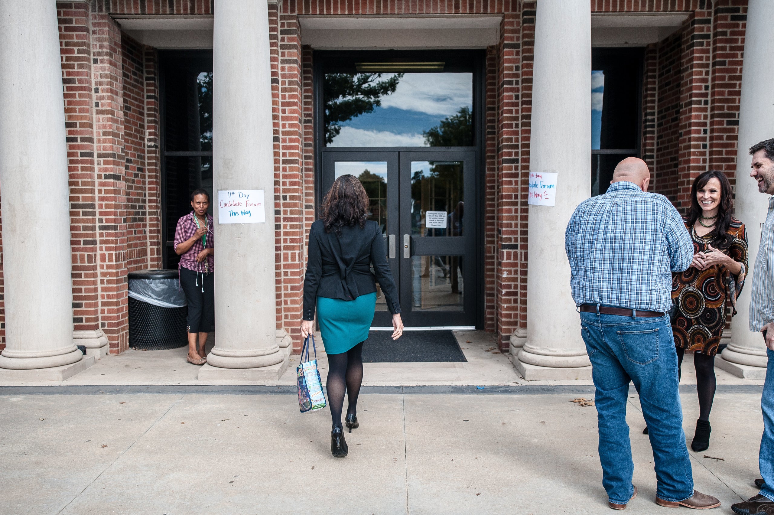 Ashley McCray walks into a Oklahoma candidate forum in Oklahoma City. 