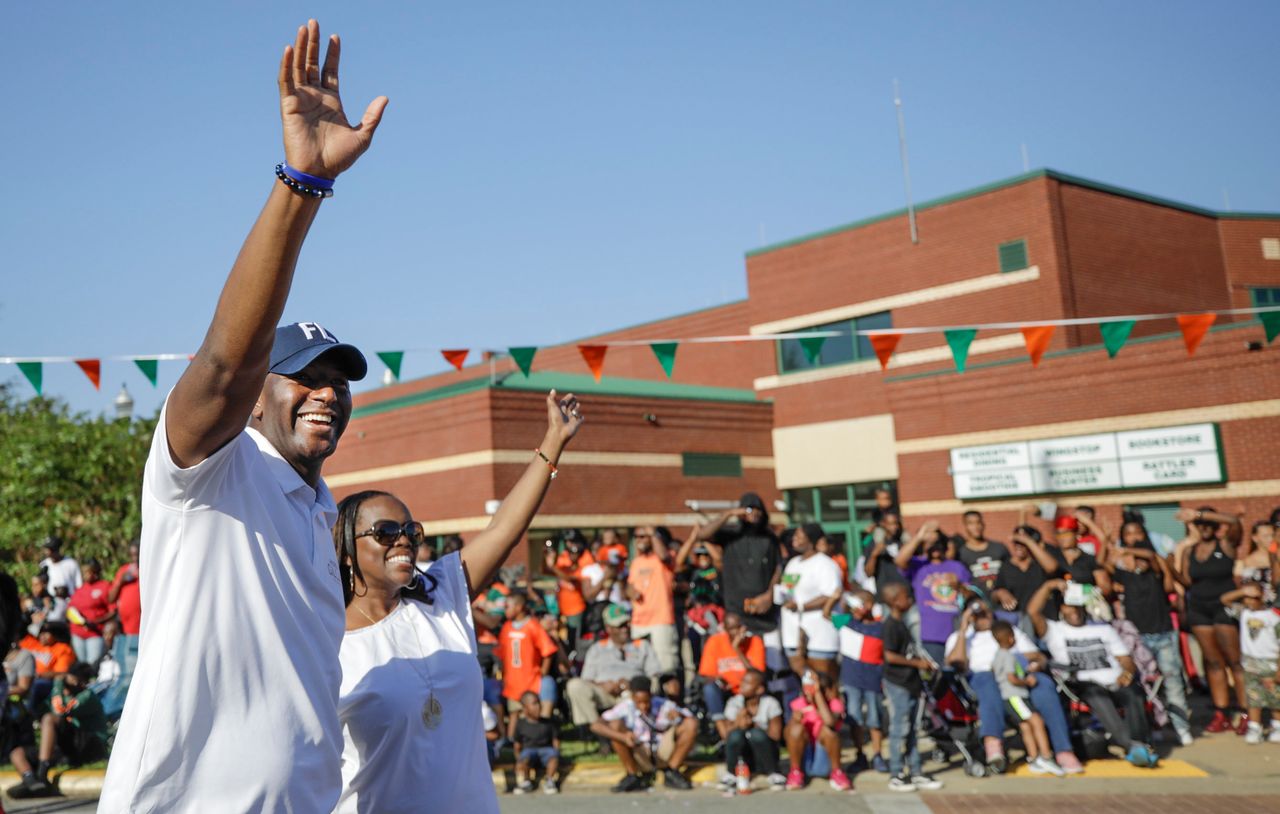 Andrew Gillum and his wife, R. Jai Gillum, at the FAMU homecoming parade. He’s a Rattler, having graduated from the university in 2003.