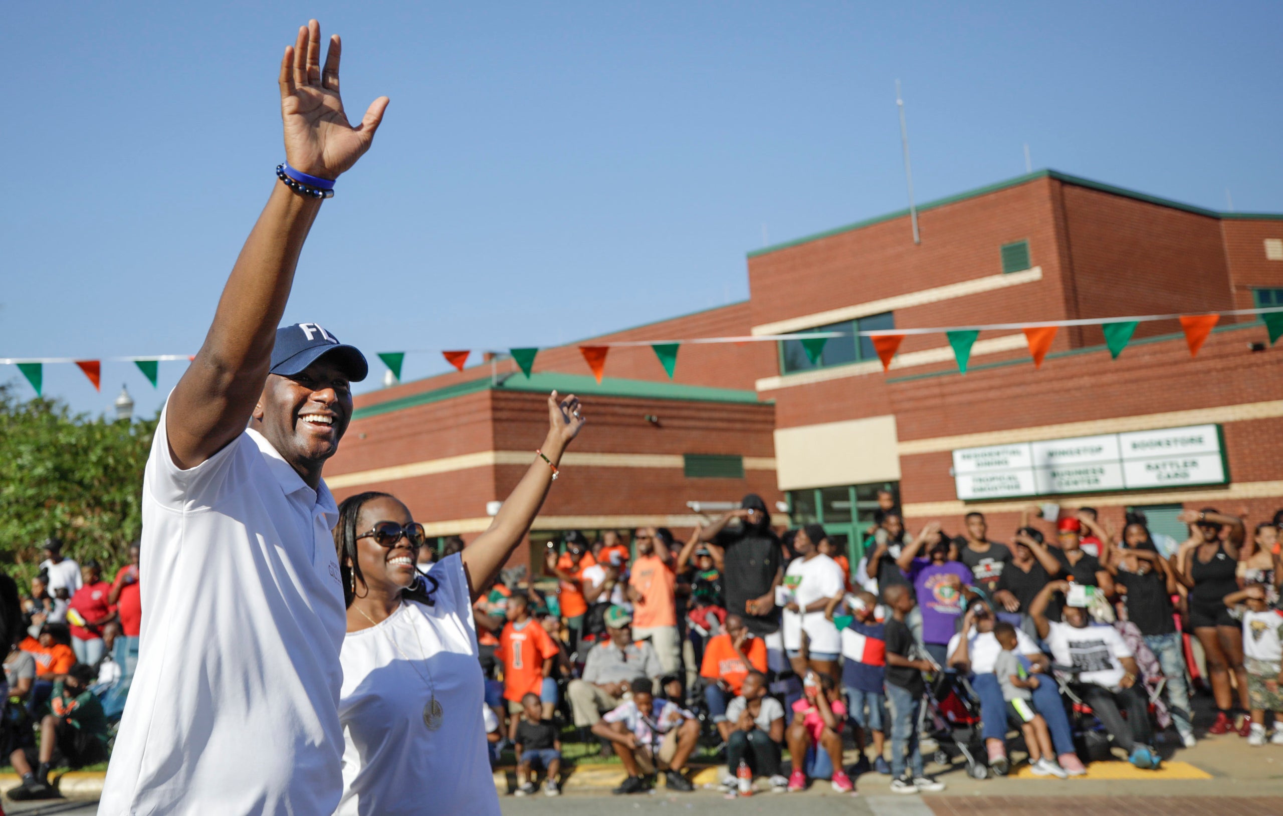 Andrew Gillum and his wife, R. Jai Gillum, at the FAMU homecoming parade.&nbsp;He&rsquo;s a Rattler, having graduated from th