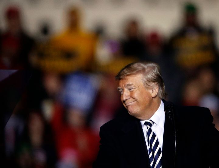 President Donald Trump rallies his fans in Columbia, Missouri, by blaming unknown forces for organizing the migrant caravan that he deems "an invasion."