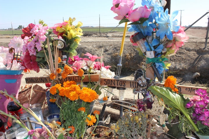 <p>A shrine sits next to a Delano road where Marcelina and Santos Garcia died in a car crash while fleeing U.S. Immigration and Customs Enforcement agents.</p>