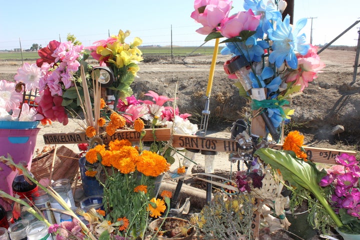 A shrine sits next to a Delano road where Marcelina and Santos Garcia died in a car crash while fleeing U.S. Immigration and Customs Enforcement agents.