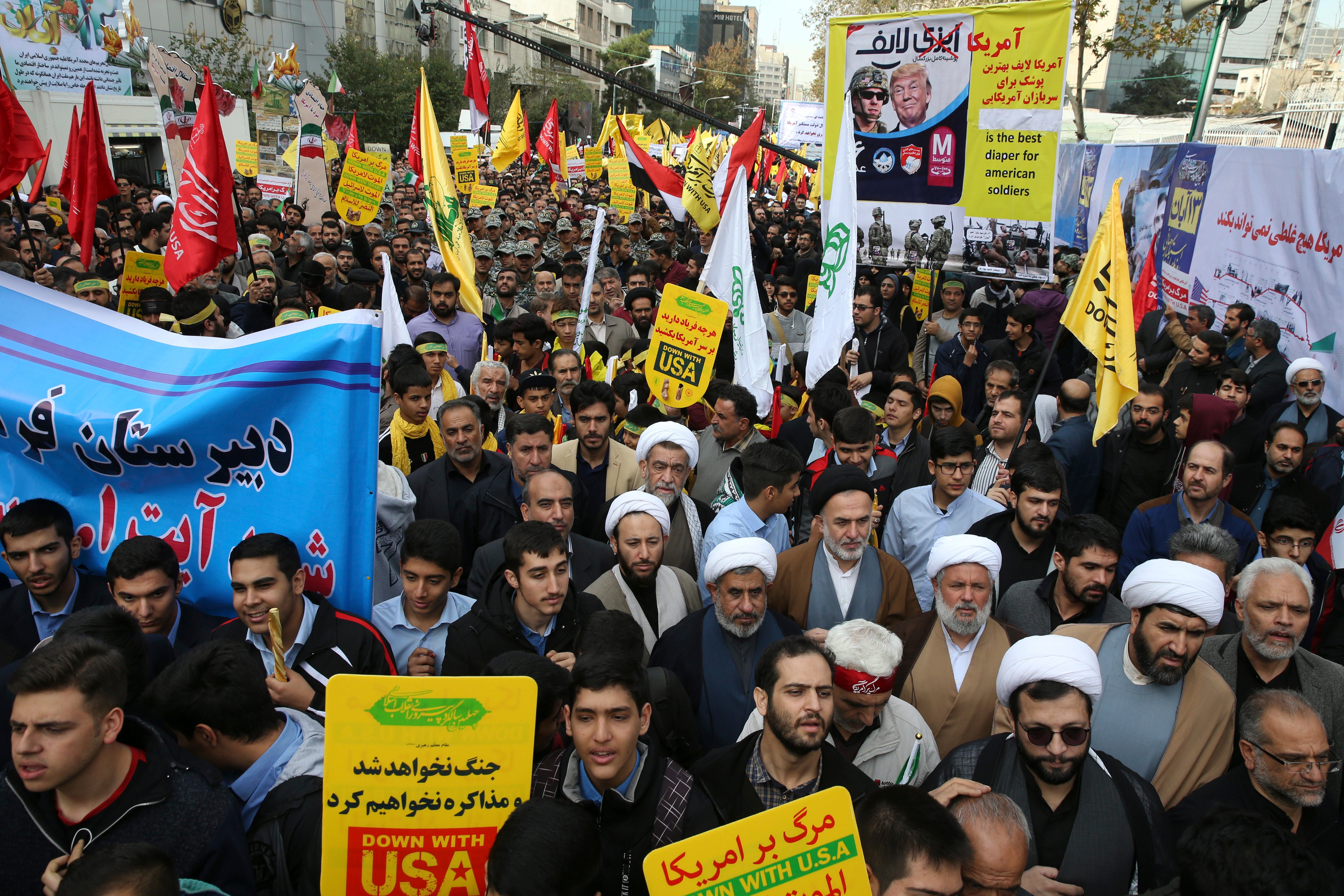 As the Trump administration restored all sanctions lifted under the nuclear deal demonstrators attended a rally in front