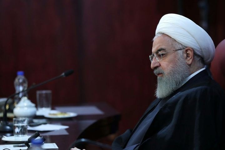 President Hassan Rouhani seen here chairing a cabinet meeting on Monday as US sanctions are re-introduced.