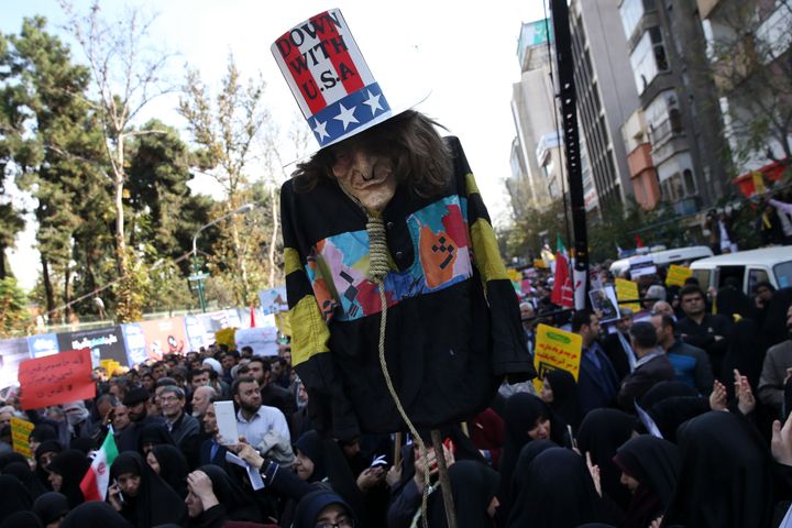 A rally against 'Uncle Sam' was held in central Tehran on Sunday ahead of re-introduced US sanctions.