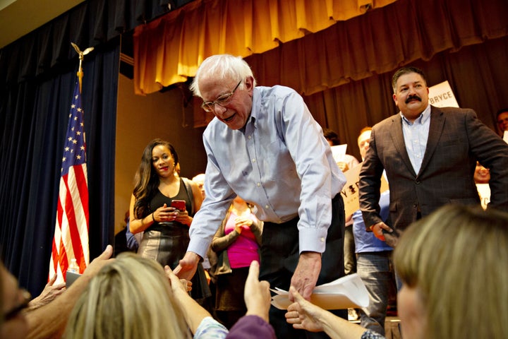 Sen. Bernie Sanders campaigns with Democratic House candidate Randy Bryce in Wisconsin. Bryce is one of many Democrats campaigning on populist economic policies in districts won by Trump in 2016.