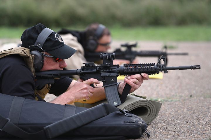 Customs and Border Protection agents fire M4 rifles during a qualification test at a shooting range on Feb. 22 in Hidalgo, Texas. CBP agents have killed at least 97 people over the last 15 years.