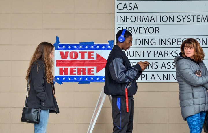 Voters were lined up outside of the Vigo County Annex in Terre Haute, Ind.,. on Monday, Nov. 5, 2018.