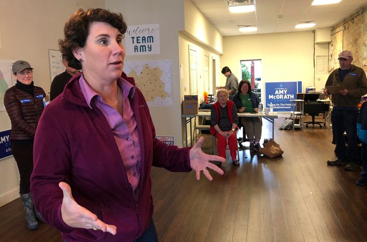 Democrat Amy McGrath speaks to supporters at a campaign field office in Winchester, Kentucky. She says Congress "has totally punted" the Afghanistan question.