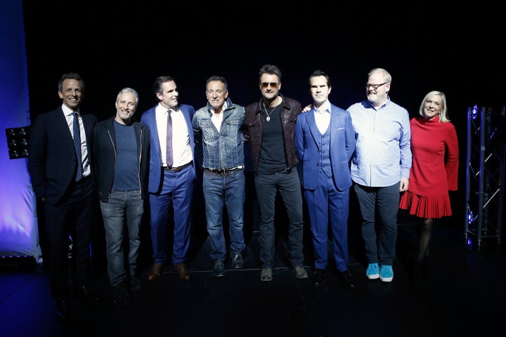 (From left) Seth Meyers, Stewart, Bob Woodruff, Bruce Springsteen, Eric Church, Jimmy Carr, Jim Gaffigan and Lee Woodruff at