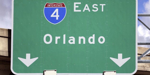 'Highway Sign pointing to Orlando, FL. Home of several family entertainment sites like Disney World, Universal Studios and S