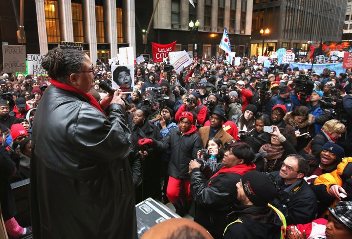 CHICAGO, IL - MARCH 27: Chicago Teachers Union President Karen Lewis speaks to demonstrators protesting school closings on March 27, 2013 in Chicago, Illinois. About 2,000 protestors held a rally and marched through downtown to protest a plan by the city to close more than 50 elementary schools, claiming it is necessary to rein in a looming $1 billion budget deficit. The closings would shift about 30,000 students to new schools and leave more than 1,000 teachers with uncertain futures. (Photo by Scott Olson/Getty Images)