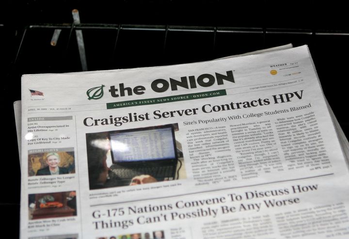 SAN FRANCISCO - MAY 05: A copy of the Onion is seen in a news rack May 5, 2009 in San Francisco, California. Satirical newspaper the Onion is ceasing publication in Los Angeles and San Francisco citing low ad revenue despite an increasing circulation. The Onion, which has a circulation of 60,000 in San Francisco, will continue to publish in other markets like Chicago and New York. (Photo by Justin Sullivan/Getty Images)