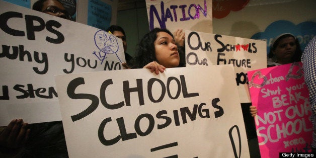 CHICAGO, IL - MARCH 25: Students protest outside the Chicago Public Schools headquarters against the city's plan to close more than 50 elementary schools on March 25, 2013 in Chicago, Illinois. Last week the city announced the plan claiming it was necessary to rein in a looming $1 billion budget deficit. The closings would shift about 30,000 students to new schools and leave more than 1,000 teachers with uncertain futures. (Photo by Scott Olson/Getty Images)