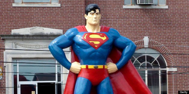 A 15-foot, 4,400-pound statue of Superman stands outside the county courthouse on 'Superman Square' in Metropolis, Illinois, U.S., on Tuesday, July 20, 2010. Residents of Metropolis are eager to turn the page on a month-long lockout pitting 220 union workers at the only uranium processing facility in the U.S. against plant owner Honeywell International Inc. Photographer: Leslie Patton/Bloomberg via Getty Images