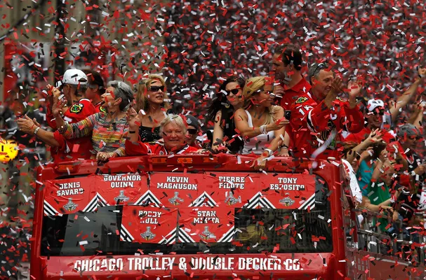 Jun 11, 2010 - Chicago, Illinois, U.S. - Fan carries fake Stanley cup on  Wacker Drive. Parade on Michigan Avenue to celebrate the Stanley Cup 2010  championship win of the Chicago Blackhawks