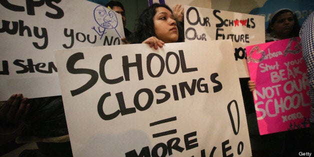 CHICAGO, IL - MARCH 25: Students protest outside the Chicago Public Schools headquarters against the city's plan to close more than 50 elementary schools on March 25, 2013 in Chicago, Illinois. Last week the city announced the plan claiming it was necessary to rein in a looming $1 billion budget deficit. The closings would shift about 30,000 students to new schools and leave more than 1,000 teachers with uncertain futures. (Photo by Scott Olson/Getty Images)