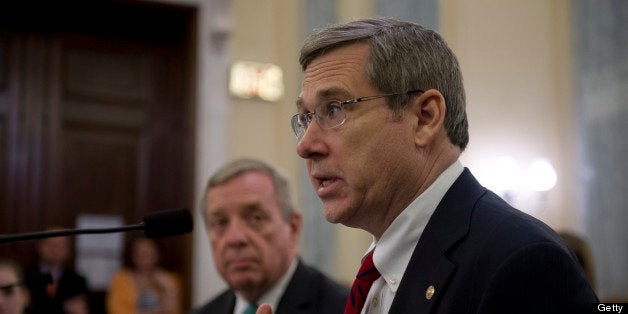 UNITED STATES - May 23 : Sen. Richard Durbin, D-IL., and Sen. Mark Kirk, R-IL., testify at the nomination hearing of Penny Pritzker to be Secretary of Commerce before the Commerce, Science, and Transportation Committee in the Russell Senate Office Building on May 23, 2013. (Photo By Douglas Graham/CQ Roll Call)