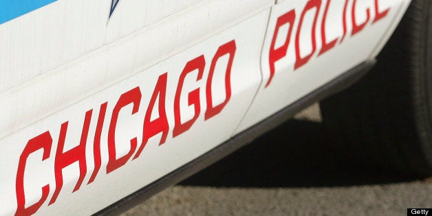 UNITED STATES - NOVEMBER 28: A police car is parked outside the headquarters of the Chicago Police Department in Chicago, Illinois, U.S., on Friday, Nov. 28, 2008. The recession is stinging in President-elect Barack Obama?s hometown, where the Chicago Police Department is slowing hiring even as murders increase. Murders in Chicago rose 16 percent in the first 10 months of the year. (Photo by Tim Boyle/Bloomberg via Getty Images)