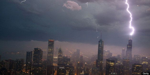 CHICAGO, IL - JUNE 12: Lightning strikes the Willis Tower (formerly Sears Tower) in downtown on June 12, 2013 in Chicago, Illinois. A massive storm system with heavy rain, high winds, hail and possible tornadoes is expected to move into Illinois and much of the central part of the Midwest today. (Photo by Scott Olson/Getty Images)